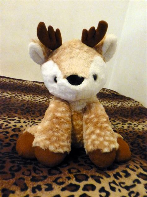 Get Cozy with Animal Adventure Winter Plush - Deer: Perfect Addition to your Seasonal Decor!